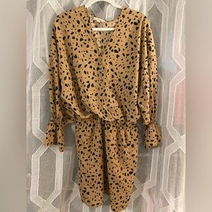 ee:some L black and tan spotted dress.